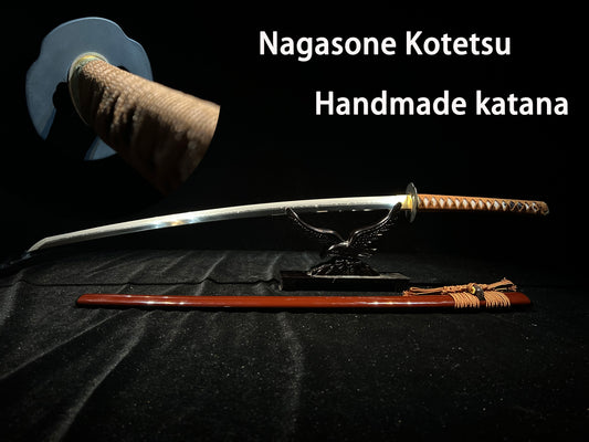 The samurai sword integrated weapon with soil-coating and quenching, made by hand and grinding the blade.